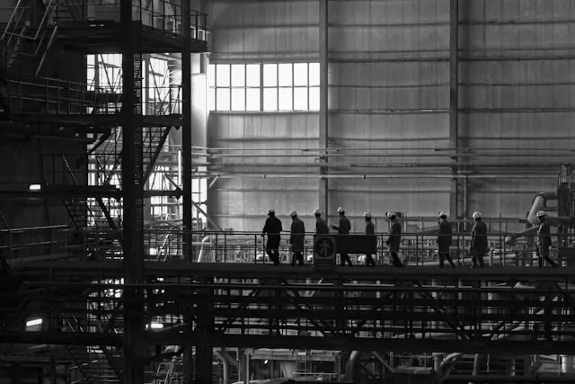 An image of employees in mining and trading industry